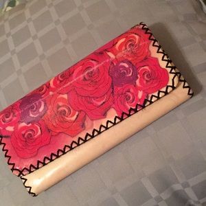 Ladies long wallet 8 slots 2 bill areas  & a zip